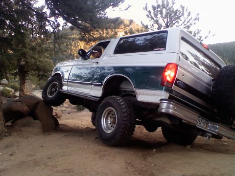1996 Ford Bronco - A 1996 Ford Bronco navigates a rocky off-road course.