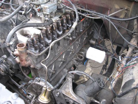 1981 Ford Bronco - New lifters installed, a new lifter cover gasket, and the bolts back in place.