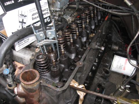 1981 Ford Bronco - Rented a valve spring compressor that can be used without removing the head. Since I don't have an air compressor, I had to use the old tri…