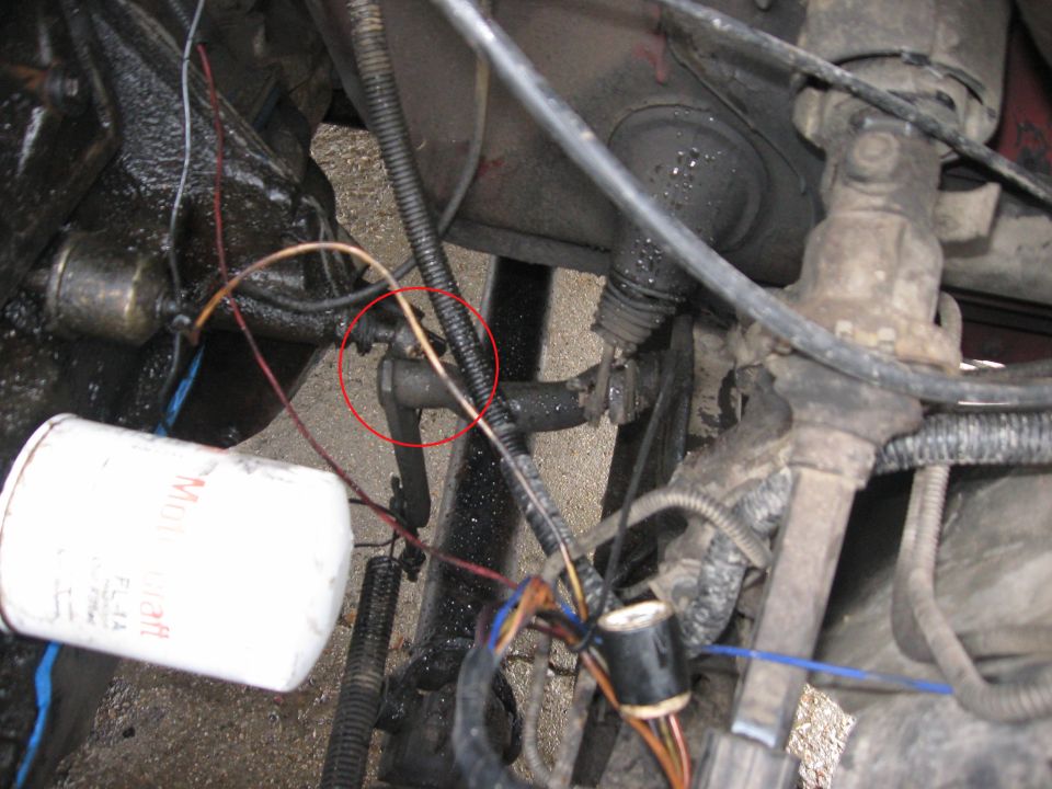 Found and issue *after* I spent hours wrestling the engine back forward and into place.  The clutch ball and socket and separated and I need to unbolt the engine again and move it to where I can connect the two again.  A big pain.

Side note:  Can see the new, blue, one piece oil pan gasket in place.  Ahhh....