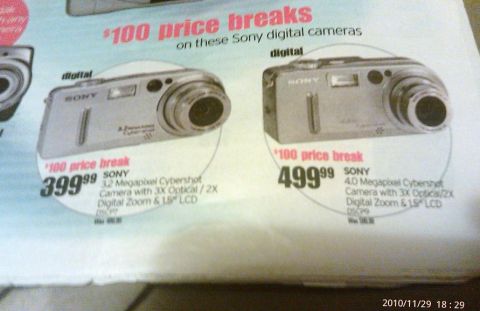 2000 Mercury Grand Marquis - Two Sony digital cameras are shown with price breaks, one for $399.99 and another for $499.99.