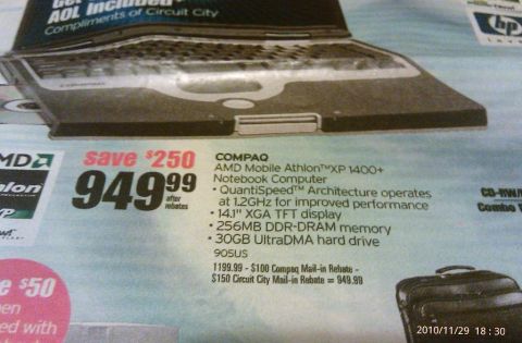 2000 Mercury Grand Marquis - Advertisement for a Compaq notebook computer, showing price and specifications.