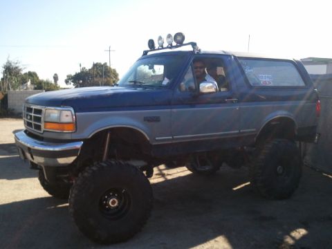 1979 Ford Bronco - This lifted Ford Bronco features a two-tone paint scheme and auxiliary lighting on the roof.