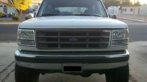 1994 Ford Bronco - Clear headlights, turn signal, and side marker from ebay retailer Streetune $115. New header panel as well.