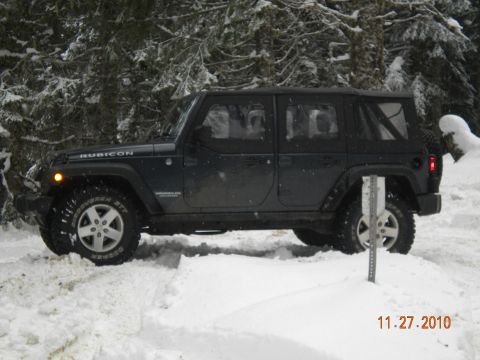 2005 Jeep Wrangler - A four-door Jeep Wrangler is parked in a snowy landscape, with a date stamp indicating November 27, 2010.