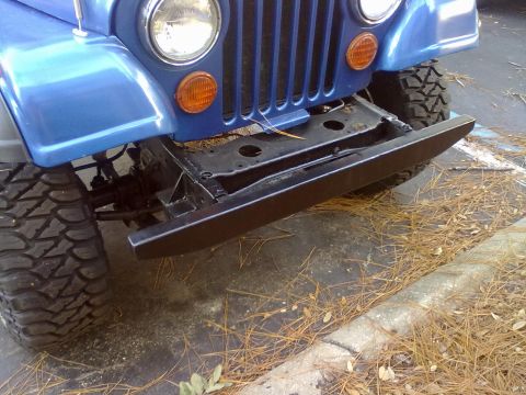 1978 Jeep CJ5 - Front view of a blue 1978 Jeep CJ5, showing its grille, headlights, and bumper.