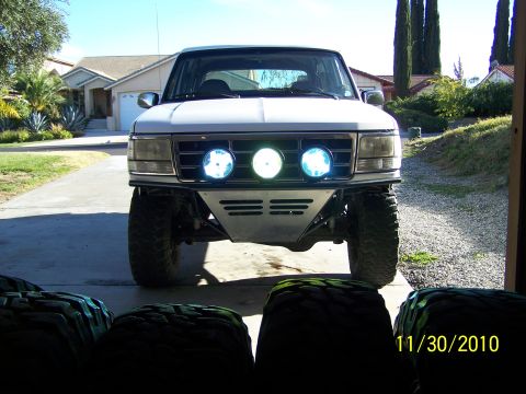 1995 Ford Bronco - Front view of a 1995 Ford Bronco with custom bumper and lights.