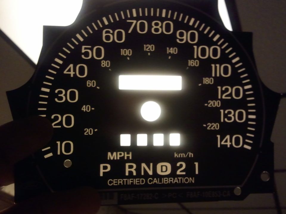 Speedometer and gear indicator on a car's dashboard