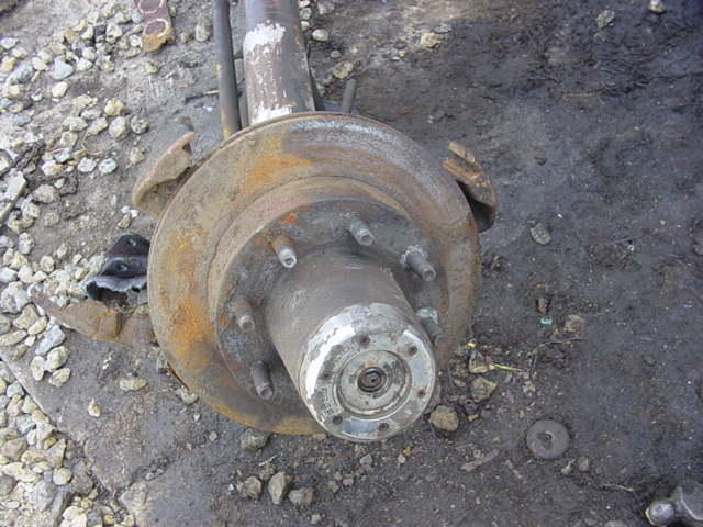 remove rotor then hub cap.