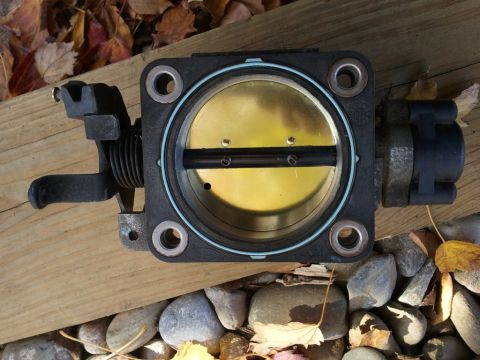 2003 Ford Crown Victoria - A throttle body part is shown, not a complete vehicle.