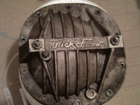1989 Ford Bronco - A close-up view of a Trick Flow differential cover, likely an aftermarket part.