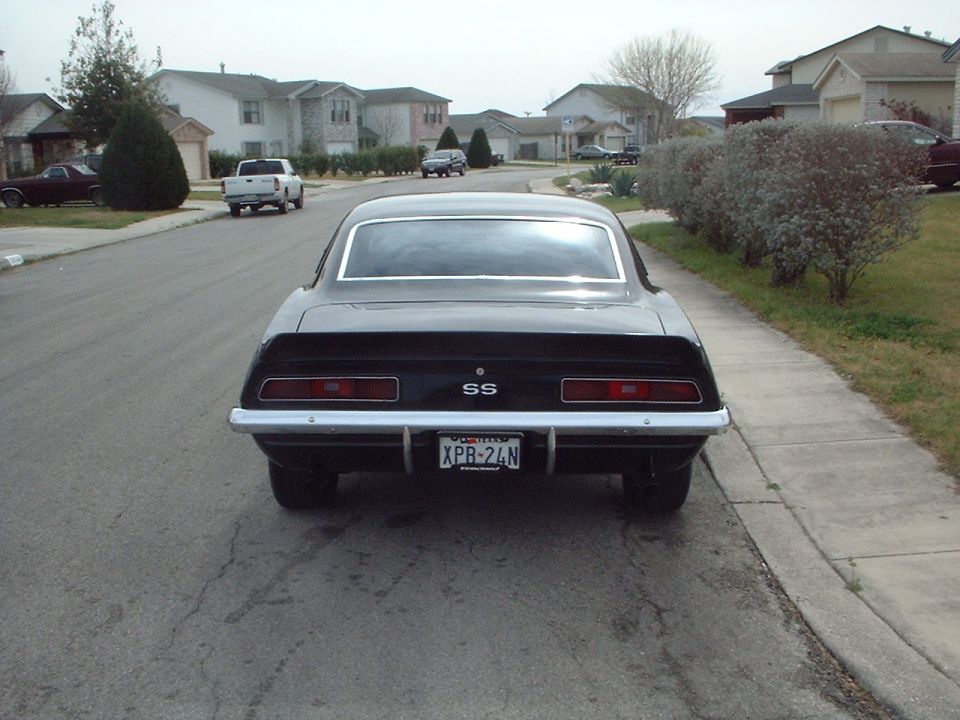 Black 1969 Chevrolet Camaro SS rear view, showing SS badge and license plate XPR-24N