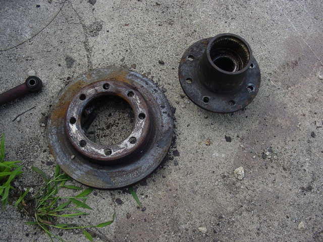 pound off studs to remove rotor