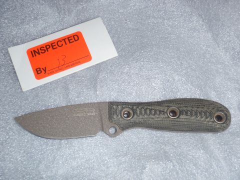 1991 Ford Bronco - A knife with a green handle and a ULINE inspection sticker is shown.