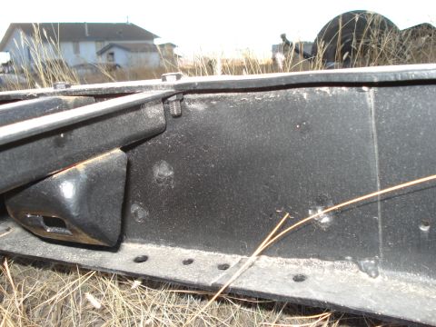 1977 Ford F-150 - Detail of a truck frame, showing structural components and mounting points.