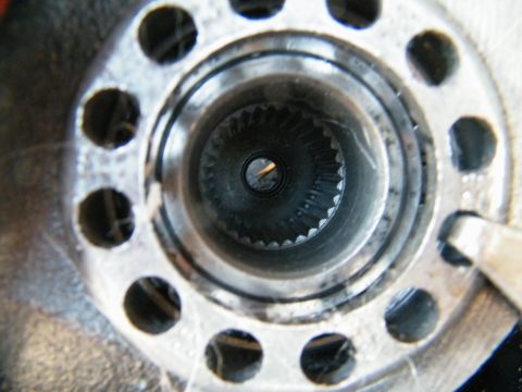 1982 Ford Bronco - A close-up view of a splined hub, likely part of a drivetrain component, with 12 visible bolt holes.