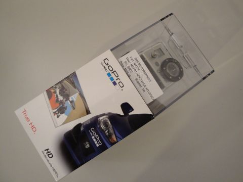 1993 Ford Taurus - A GoPro HD Motorsports HERO camera is displayed in its clear plastic packaging.