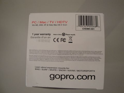 1993 Ford Taurus - This is the back of a GoPro product box, detailing its compatibility and warranty information.