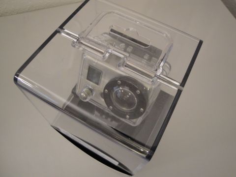 1993 Ford Taurus - A GoPro camera is enclosed in a clear protective case, displayed on a flat surface.