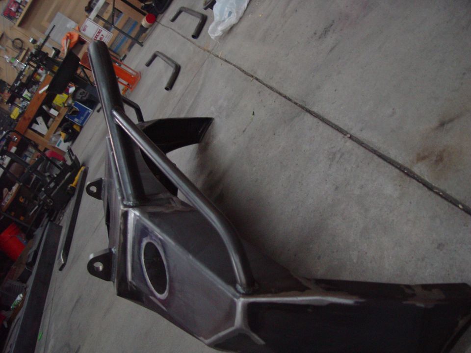 Custom steel bumper with integrated hoop protection