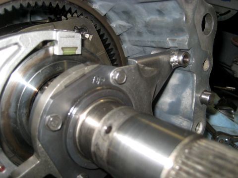 1996 Ford Bronco - A close-up view of a metal component stamped with '10P', likely from a vehicle's transfer case.