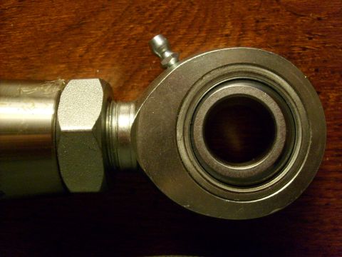 1986 Ford Bronco - This is a close-up view of a rod end bearing, a component often used in automotive suspension systems.