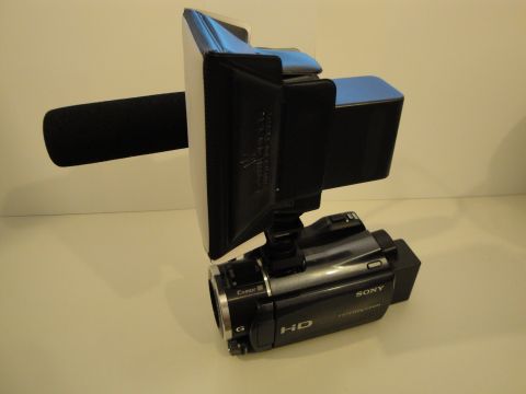 1993 Ford Taurus - A Sony Handycam camcorder is shown with a microphone and a light attachment.