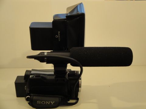 1993 Ford Taurus - Sony video camera with microphone and battery pack, labeled 'Made in USA'.