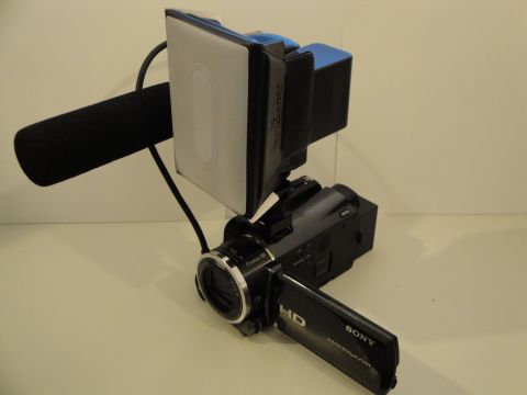 1993 Ford Taurus - A Sony Handycam camcorder is equipped with a directional microphone and an LED light panel for enhanced recording capabilities.