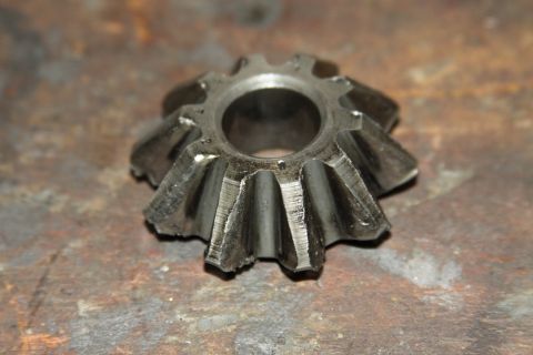 2004 Jeep TJ - Close-up of a damaged differential spider gear, likely from a Jeep TJ.