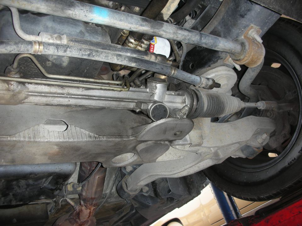 Underbody view of steering rack and sway bar