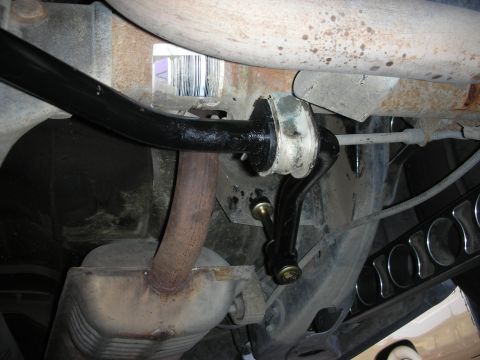 2004 Ford Crown Victoria - Rear sway bar installation in progress, showing new components and suspension parts.