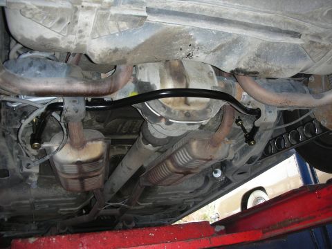 2004 Ford Crown Victoria - New sway bar installation visible on the undercarriage of a 2004 Ford Crown Victoria.