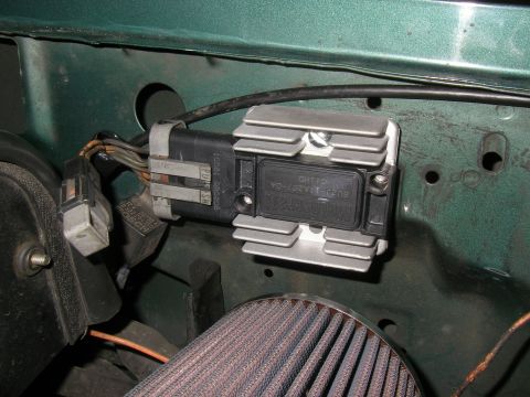 1990 Ford Bronco - Close-up of an ignition control module with a heat sink and visible part number.