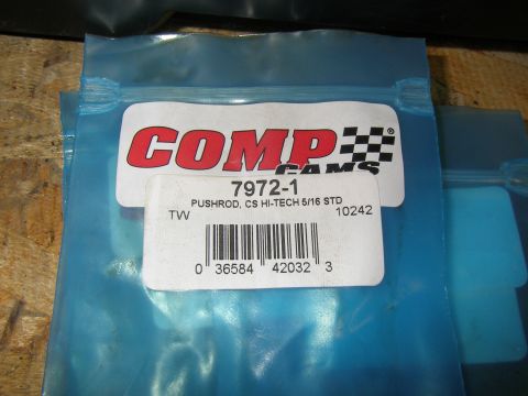 1990 Ford Bronco - A close-up of a package containing Comp Cams pushrods, part number 7972-1.