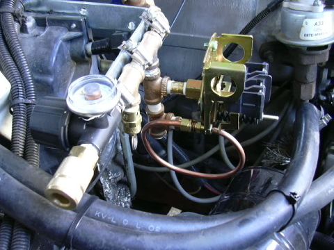 1991 Ford Bronco - Bleeder valve plumbed in. I later disabled this is it bled off 20psi every time the system hit 125psi and caused the compressor to cycle en…