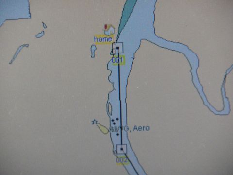 1991 Ford Bronco - Photograph of a marine GPS chartplotter display with home and numbered waypoints, not a technical document.