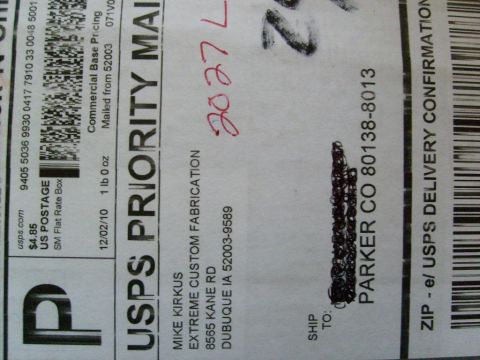 1986 Ford Bronco - Shipping label shows USPS Priority Mail with sender and recipient details.