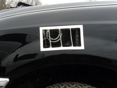 2007 Ford Mustang - This photo shows a custom vent installed on the fender of a black vehicle, not a 2007 Ford Mustang.