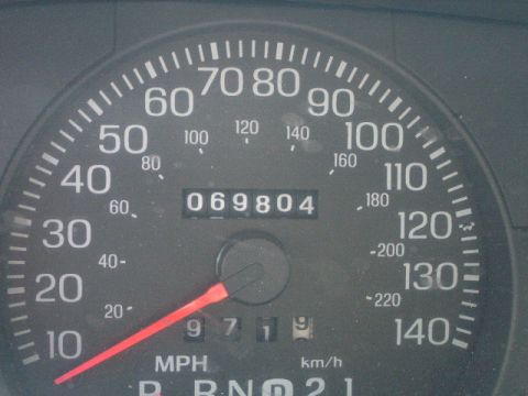 2003 Ford Crown Victoria - The speedometer shows a reading of 069804 miles, with the trip meter at 9719.