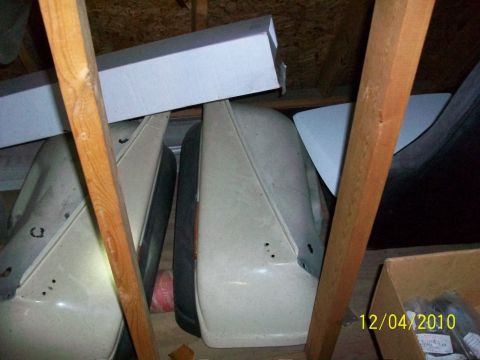 1986 Jeep Wagoneer - Car doors and body panels stored in an attic space.