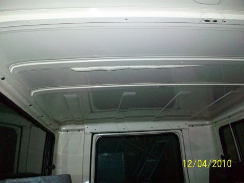 1986 Jeep Wagoneer - Interior view of the vehicle's ceiling, showing signs of wear and potential water damage.