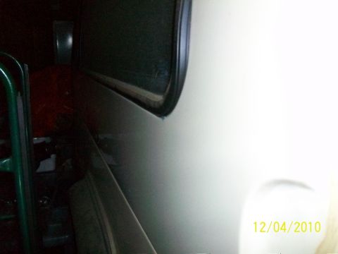 1986 Jeep Wagoneer - Interior view of a vehicle, focusing on the dashboard and door panel details.