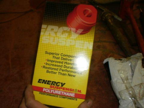 1995 Ford Bronco - A yellow box displays "Energy Suspension Polyurethane Performance Components" and a red bushing.