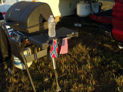 2007 Ford Mustang - Outdoor grill setup with American and Confederate flags displayed.