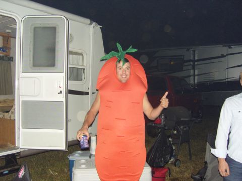 2007 Ford Mustang - Man in a carrot costume poses for a photo with an RV in the background.