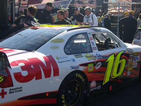2007 Ford Mustang - A race car, likely not a 2007 Ford Mustang, is seen with prominent 3M and number 16 branding.