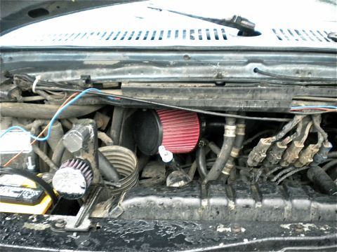1989 Ford Bronco - Aftermarket air filters installed in the engine bay.