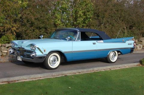 1991 Ford LTD Crown Victoria - This 1959 Dodge Custom Royal Convertible has a two-tone paint scheme and a black soft top.