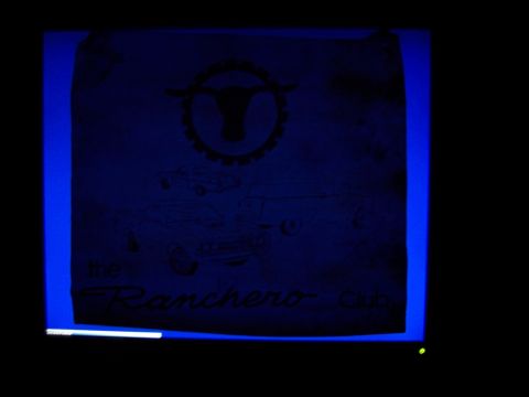 1975 Ford Ranchero - A dark image shows a graphic with a bull logo and two vehicle illustrations, one of which is labeled 'Ranchero'.